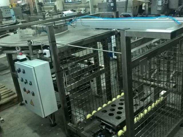 Комплекс загрузки и выгрузки тары из прямоугольных автоклавных корзин (с подвижным дном) в Зубовой Поляне